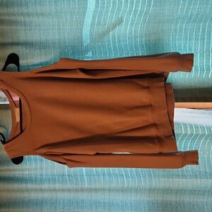 Off the shoulder pink blush sweatshirt. States XL but definitely fits like a M/L